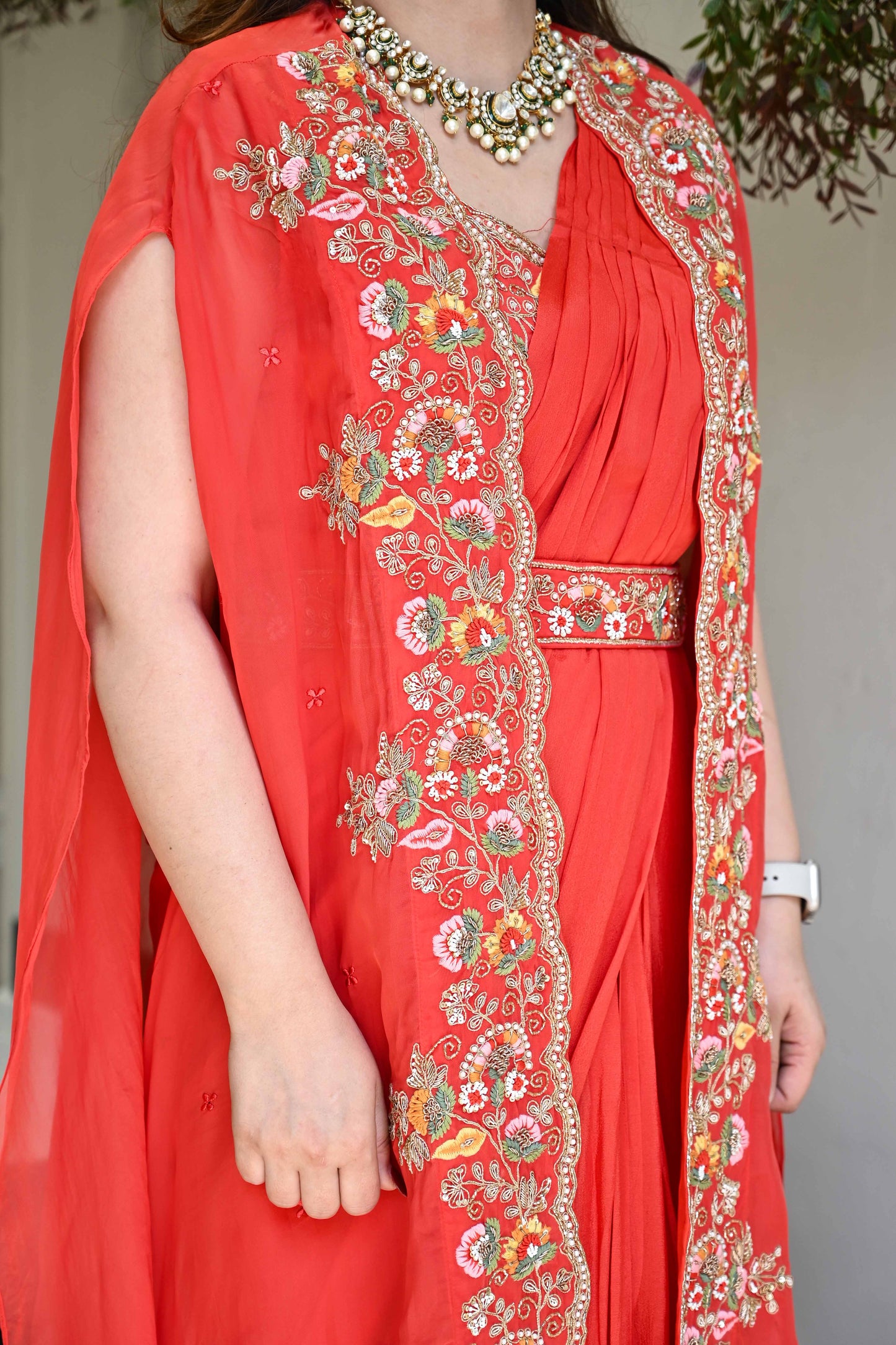 Keerna Orange Anarkali With Attached Dupatta And Cape