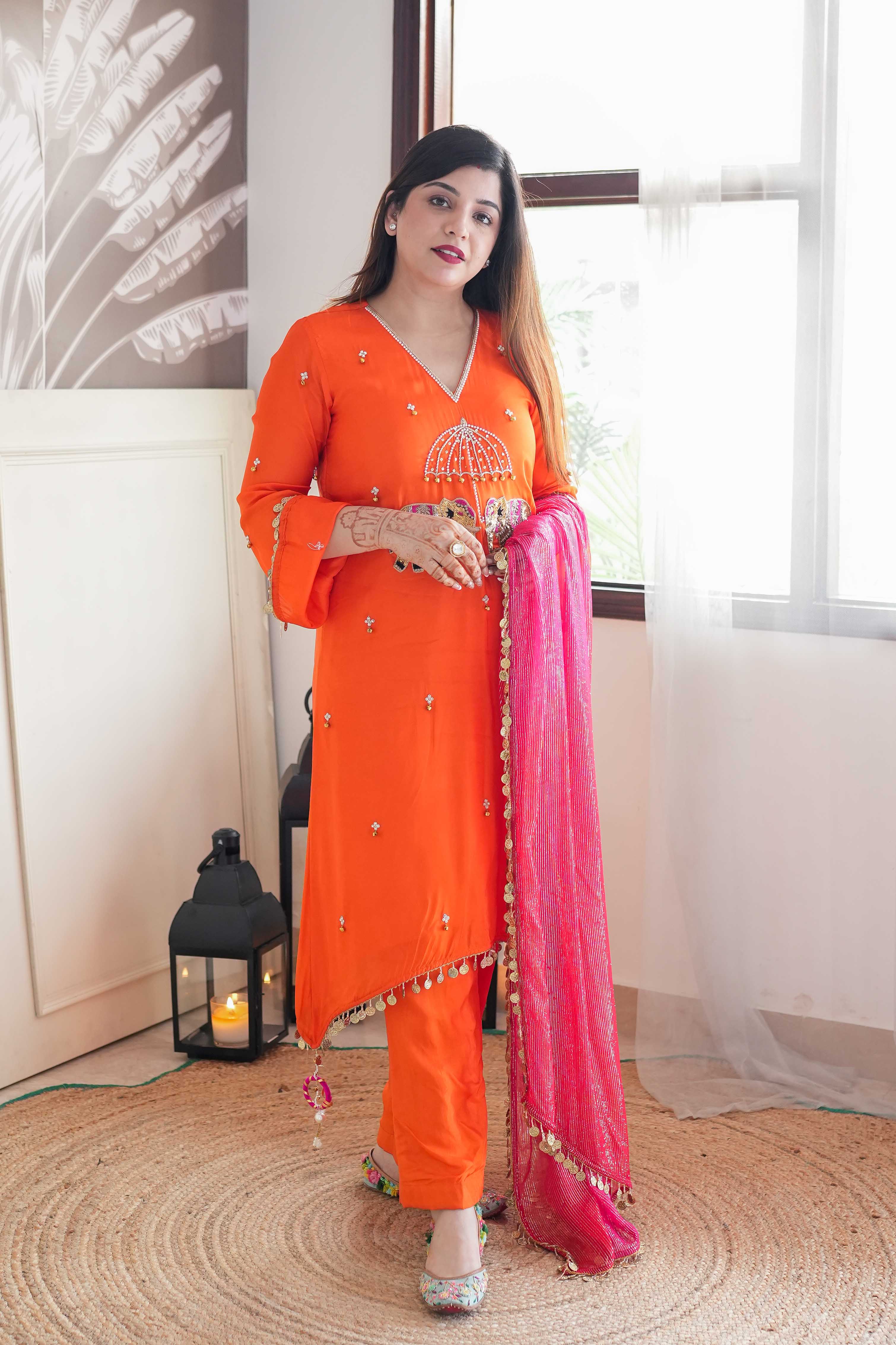 Inayat Orange Suit With Pink Dupatta