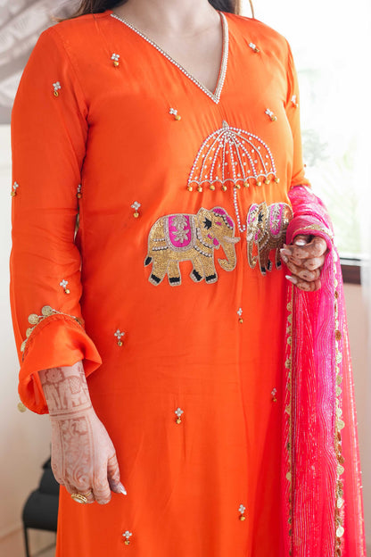 Inayat Orange Suit With Pink Dupatta