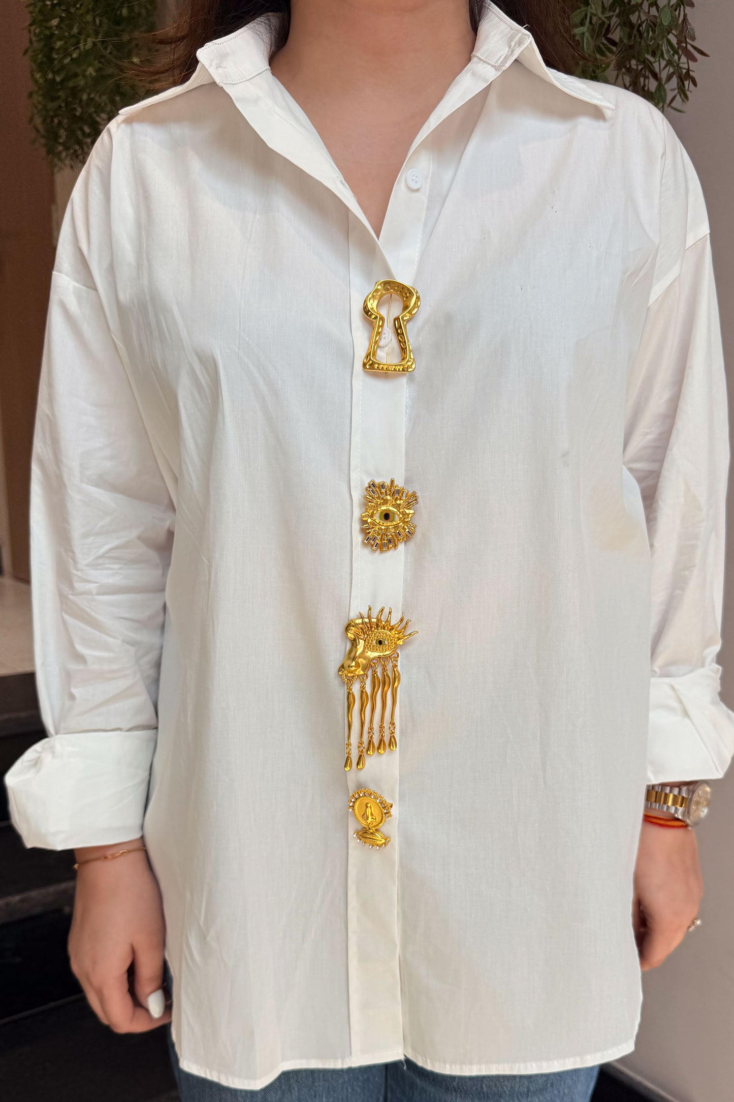 Jermaine White Shirt with Golden Brooch