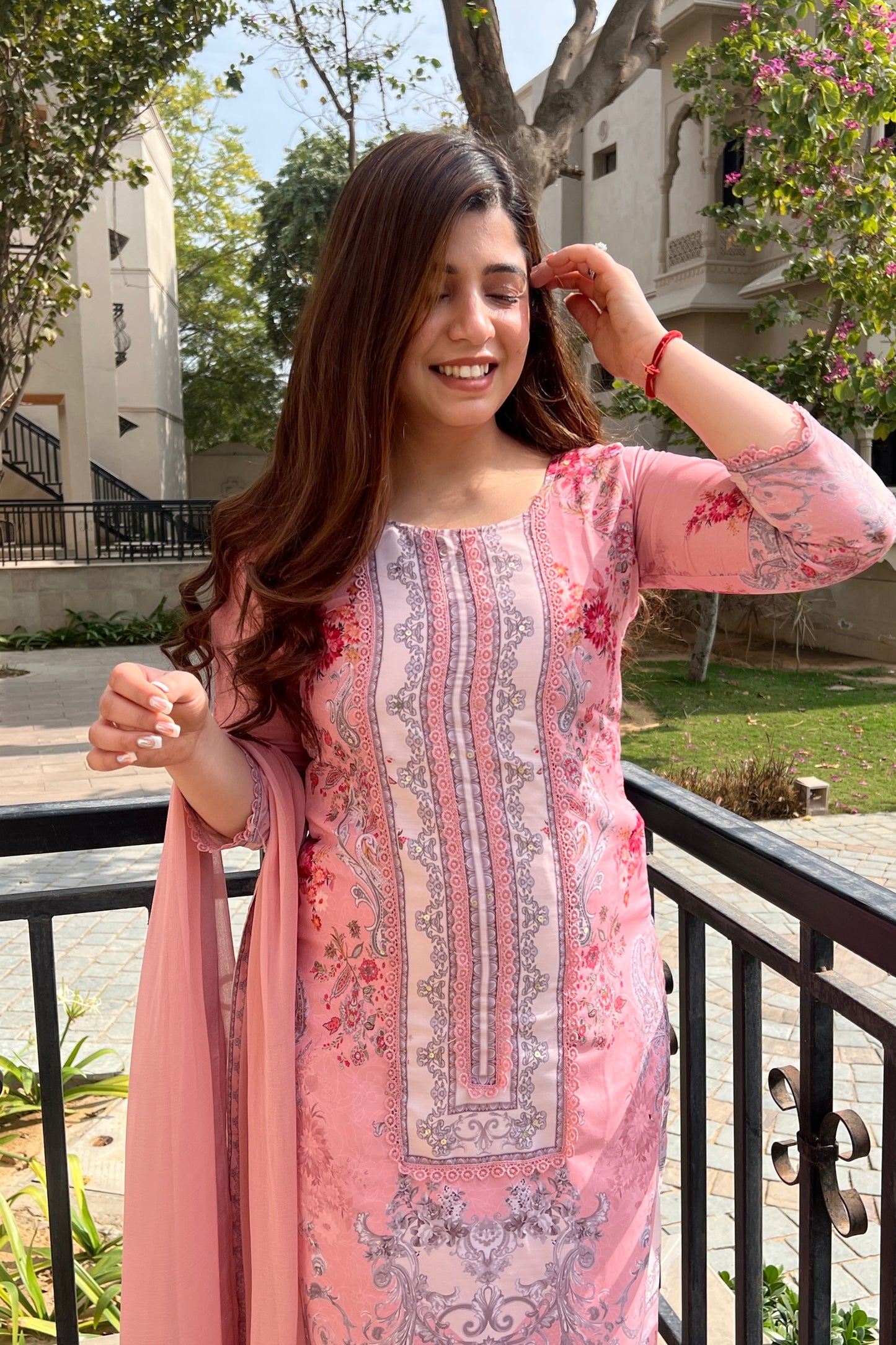 Zeril Peach Printed Pakistani Suit