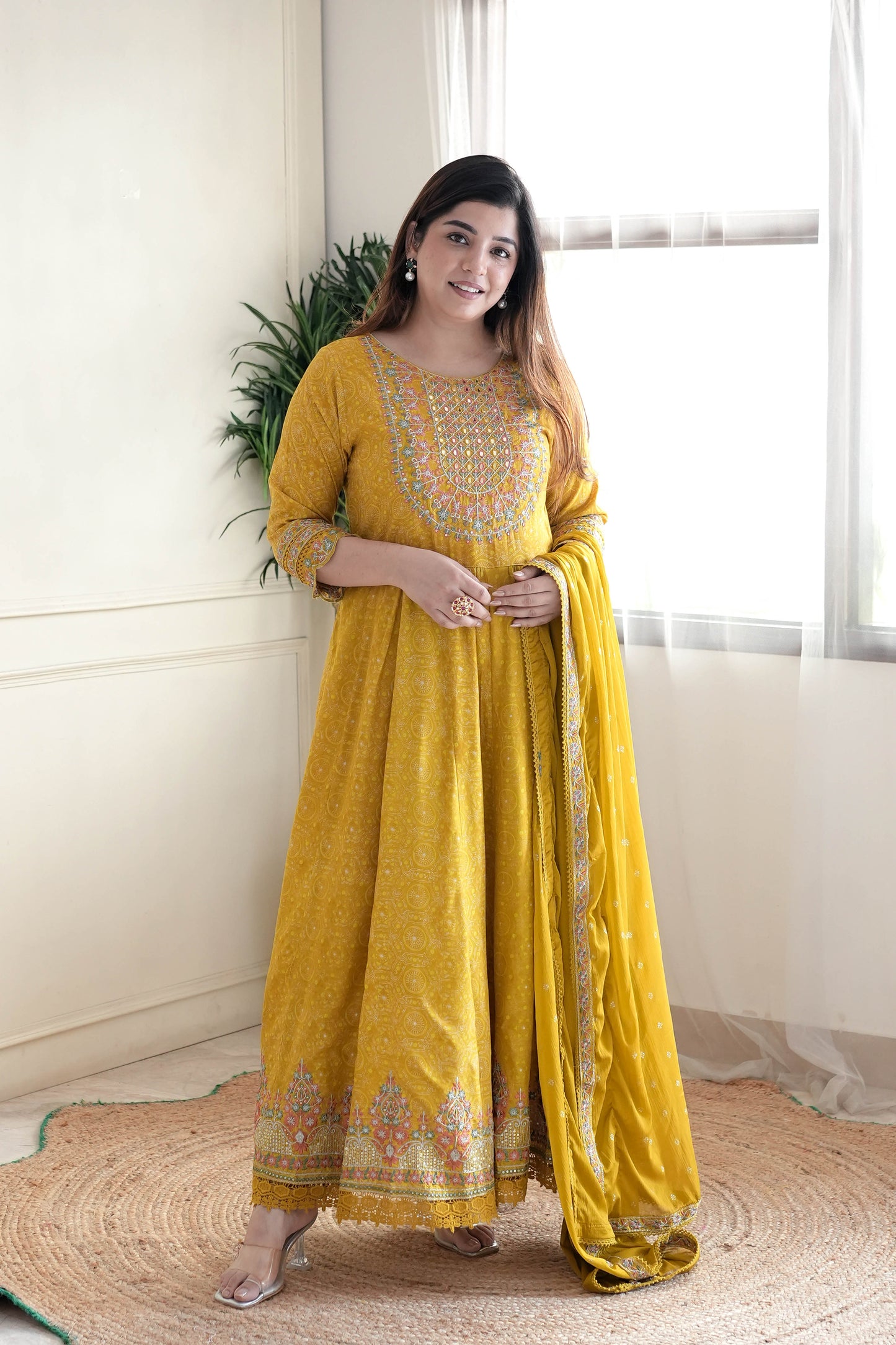 Meera Yellow Voluminous And Embroidred Anarkali Suit