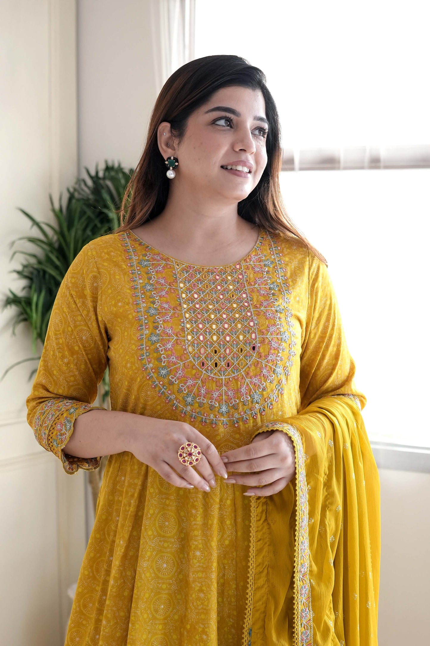 Meera Yellow Voluminous And Embroidred Anarkali Suit