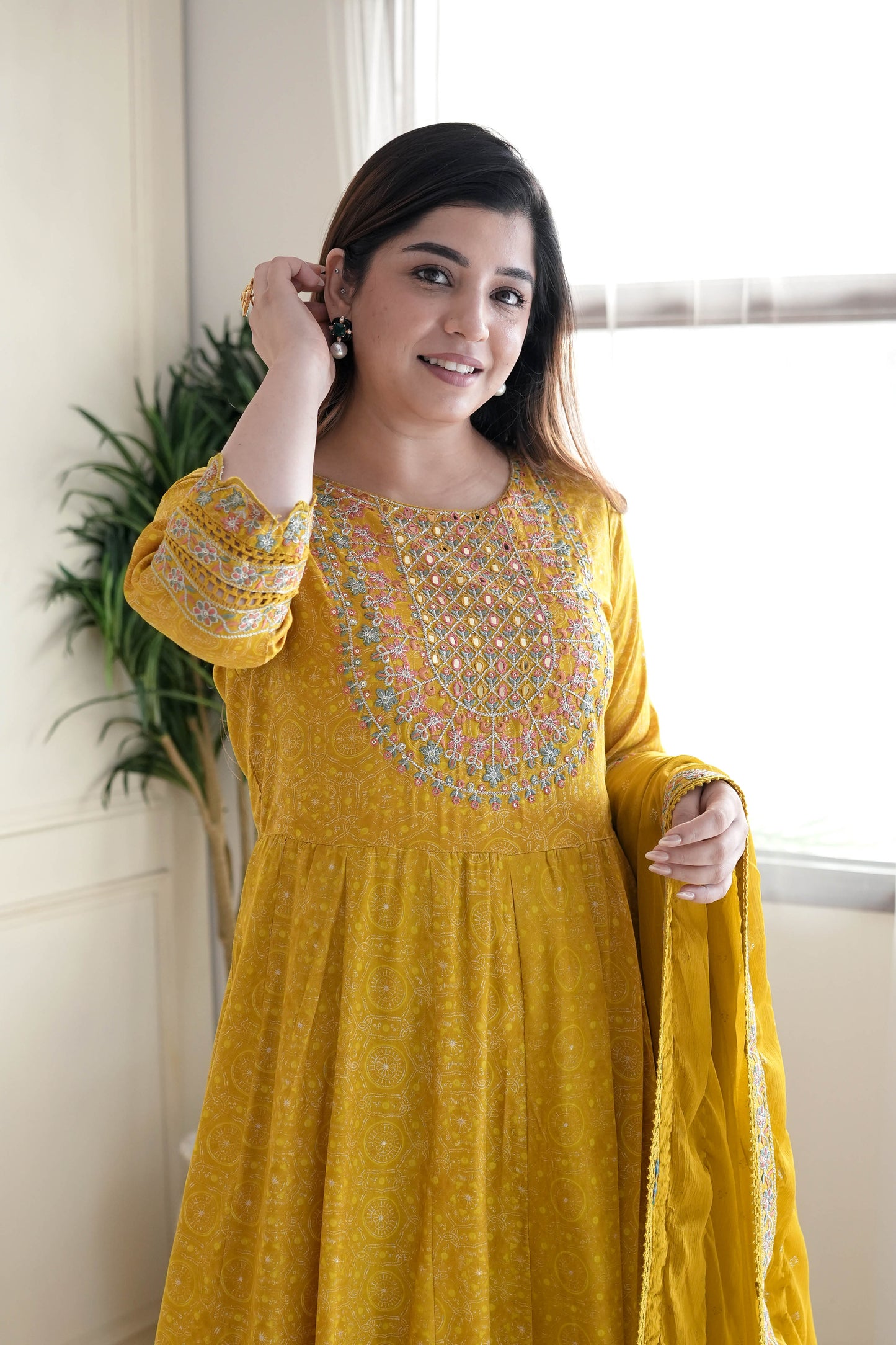 Meera Yellow Voluminous And Embroidred Anarkali Suit