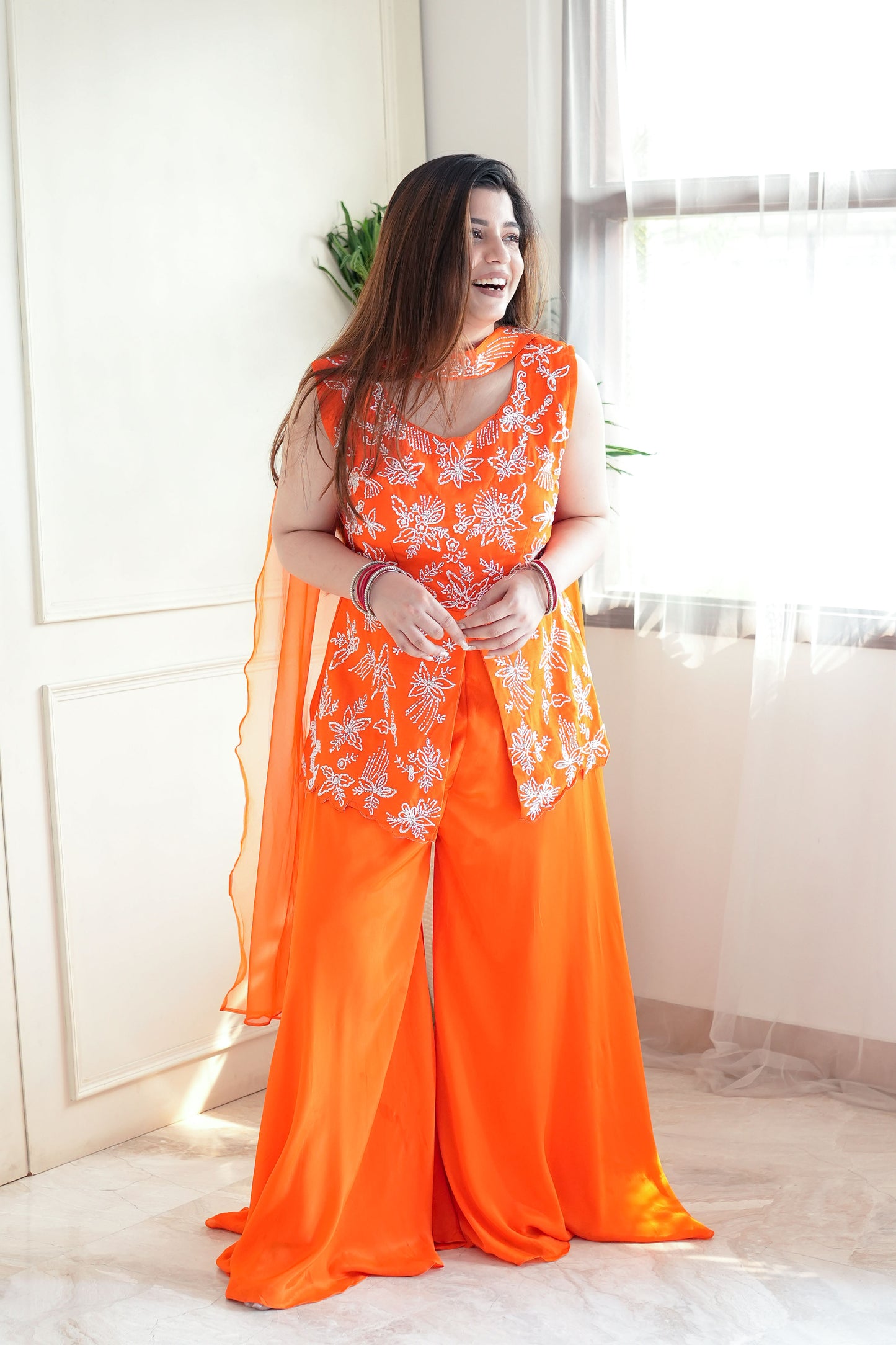 Sukoon Orange Embroidered Suit