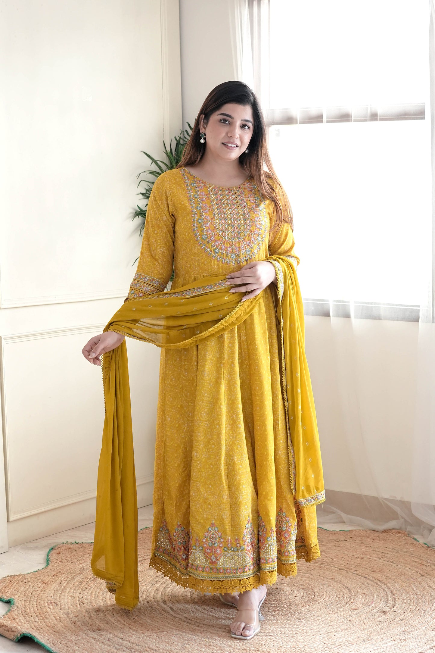 Meera Yellow Voluminous And Embroidred Anarkali Suit